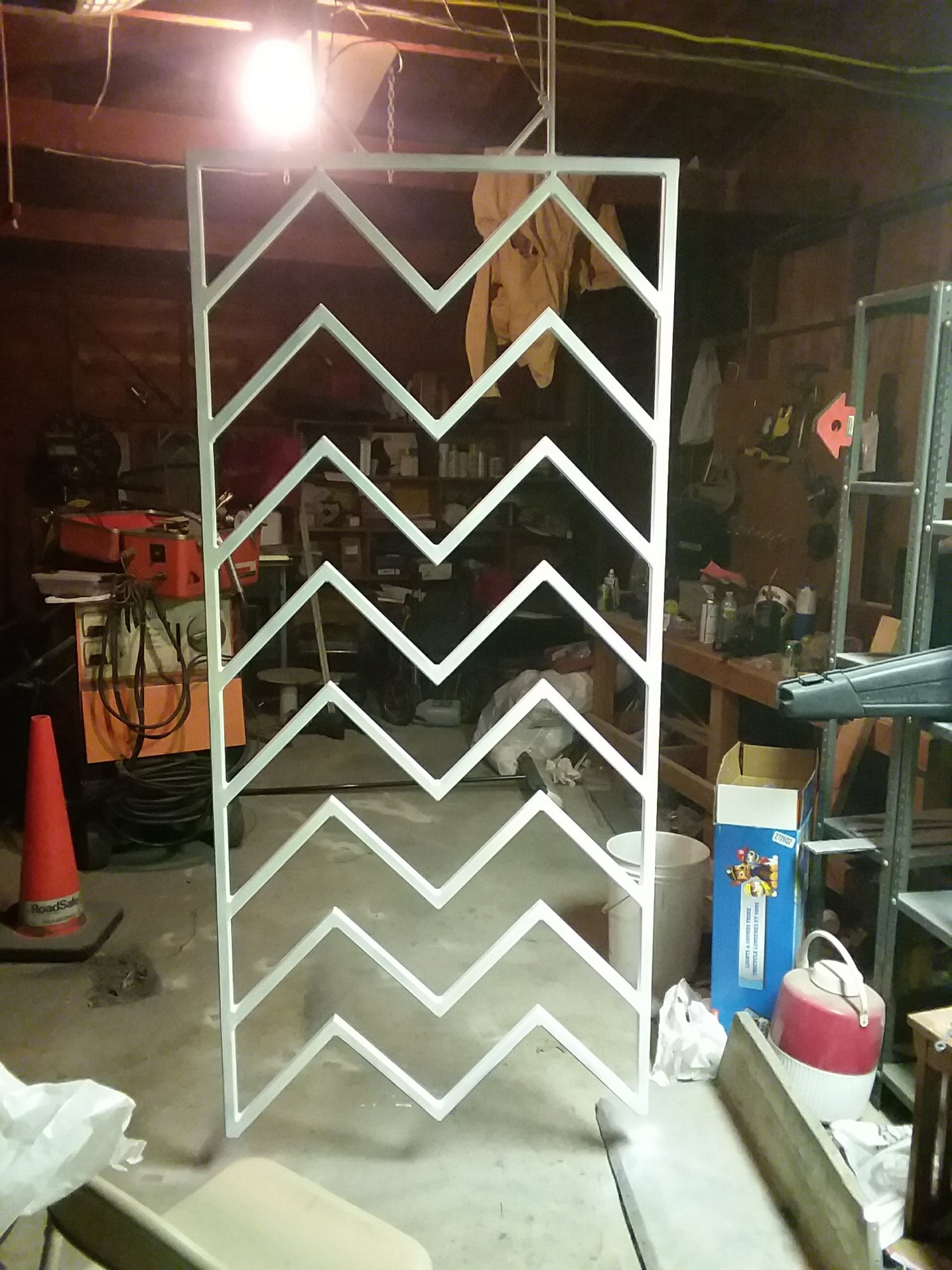 Custom chevron display frame — painted and finished
