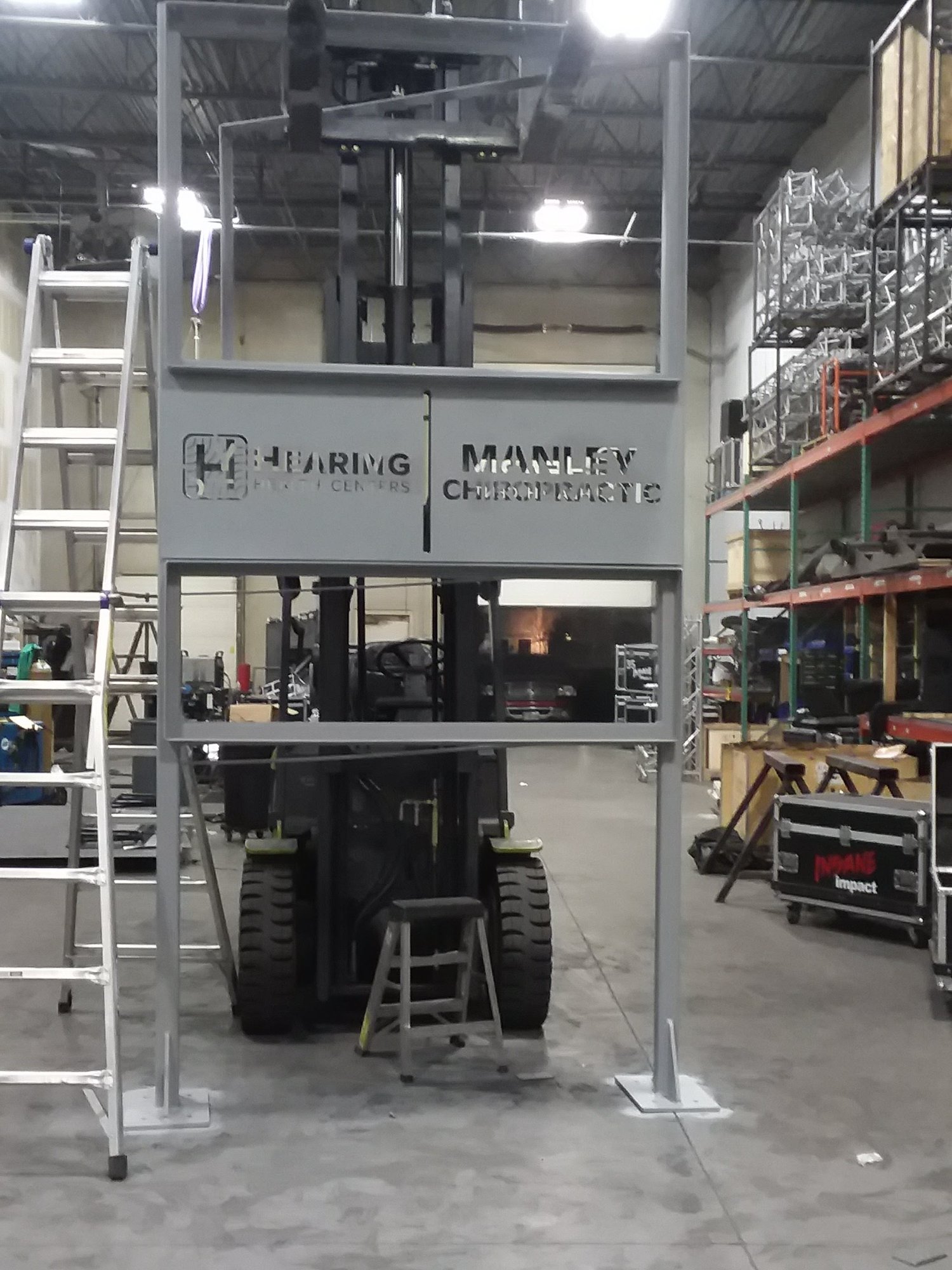 Large fabricated sign structure — Hearing Health Centers / Manley Chiropractic