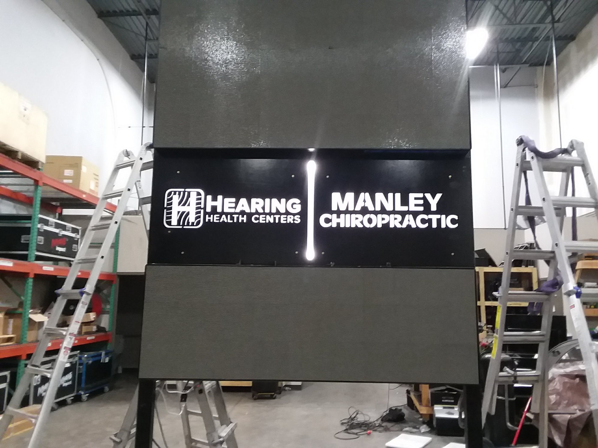 Completed LED billboard sign structure — Hearing Health Centers and Manley Chiropractic