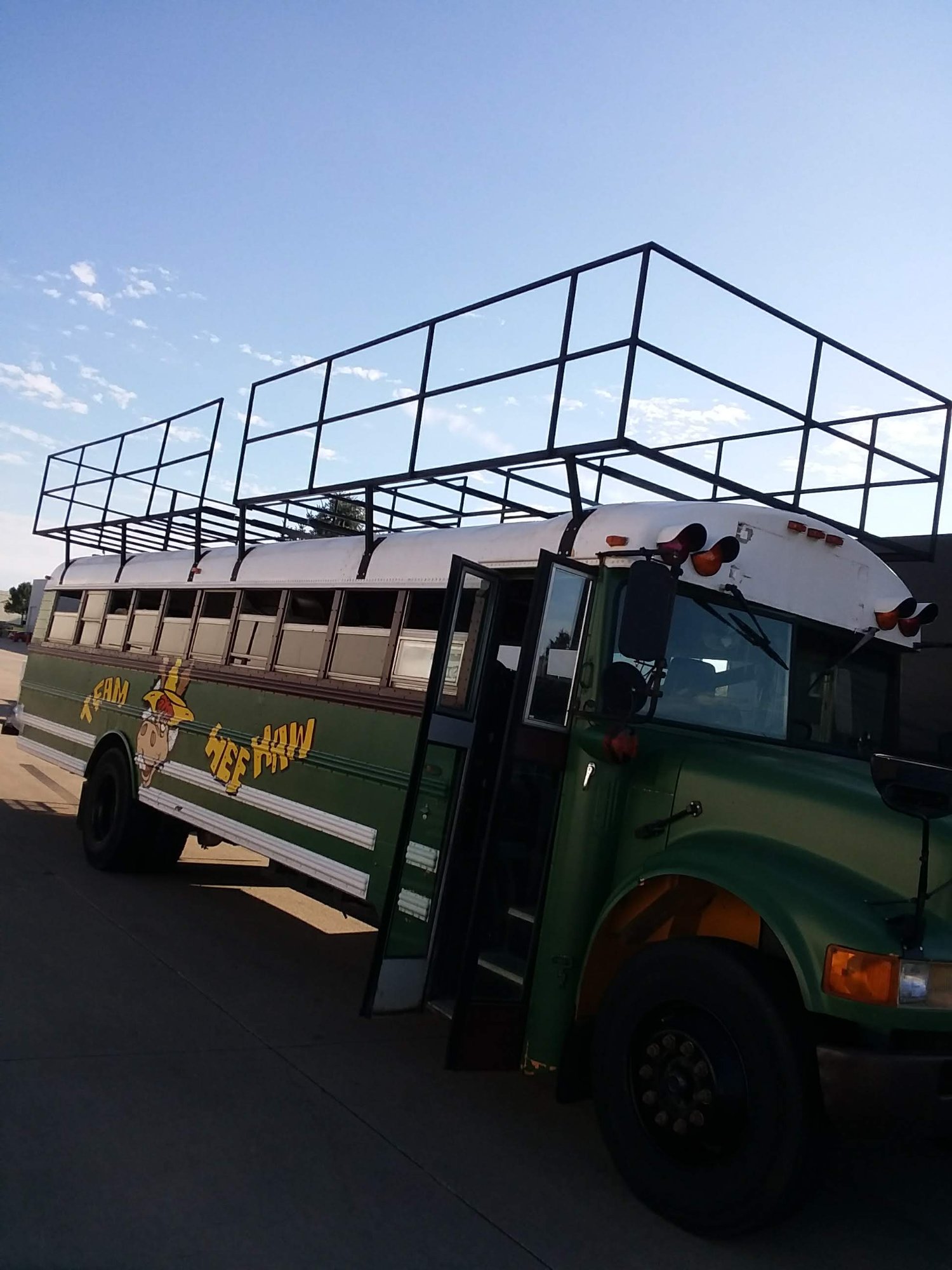 Custom steel roof rack fabricated on Team Hee Haw school bus — Comito Welding Iowa